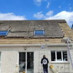 Professional roof replacement service on a residential house in Dublin.